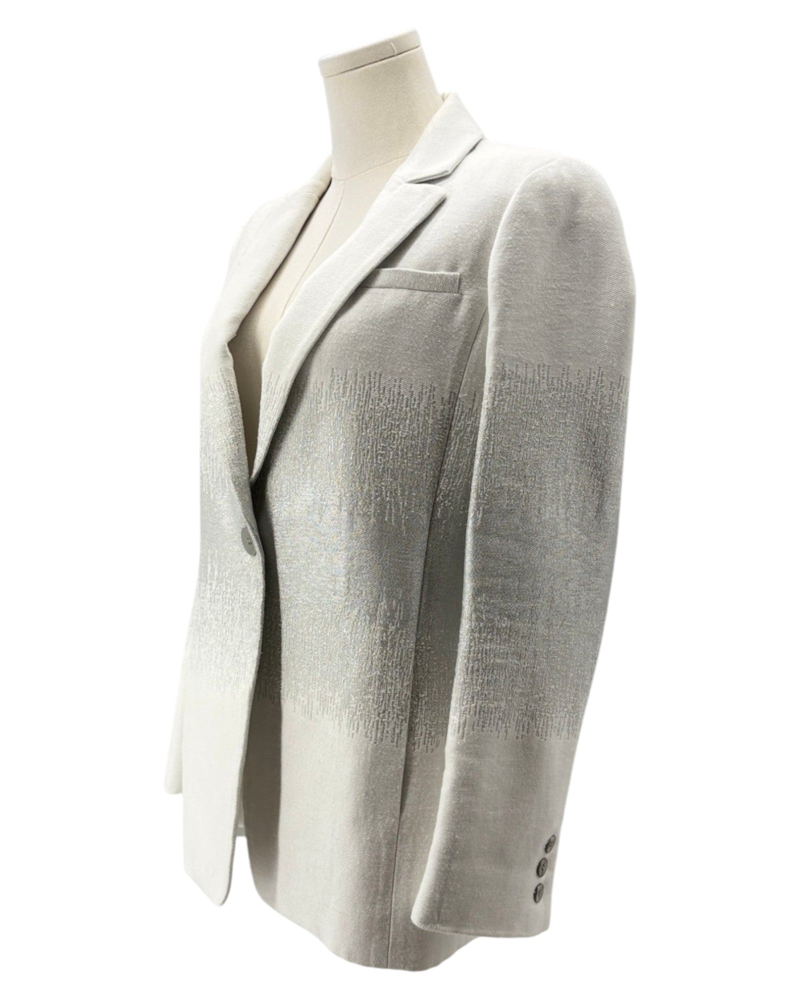 Light gray blazer on a mannequin against a white background