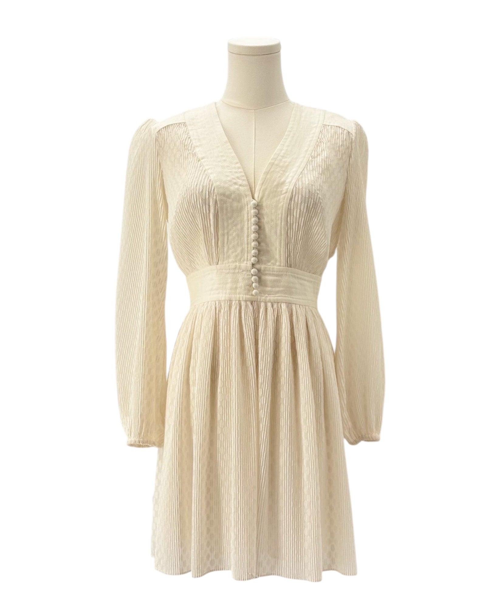 Zimmerman cream dress on a mannequin against a white background