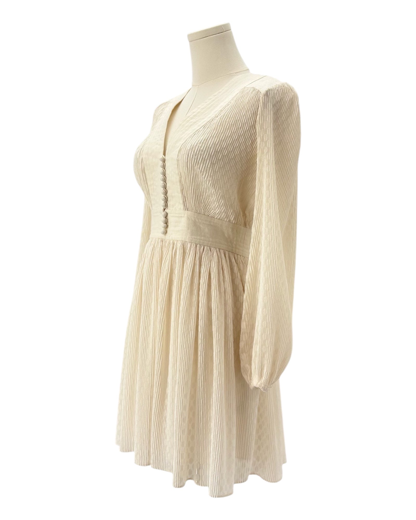 Zimmerman cream dress on a mannequin against a white background