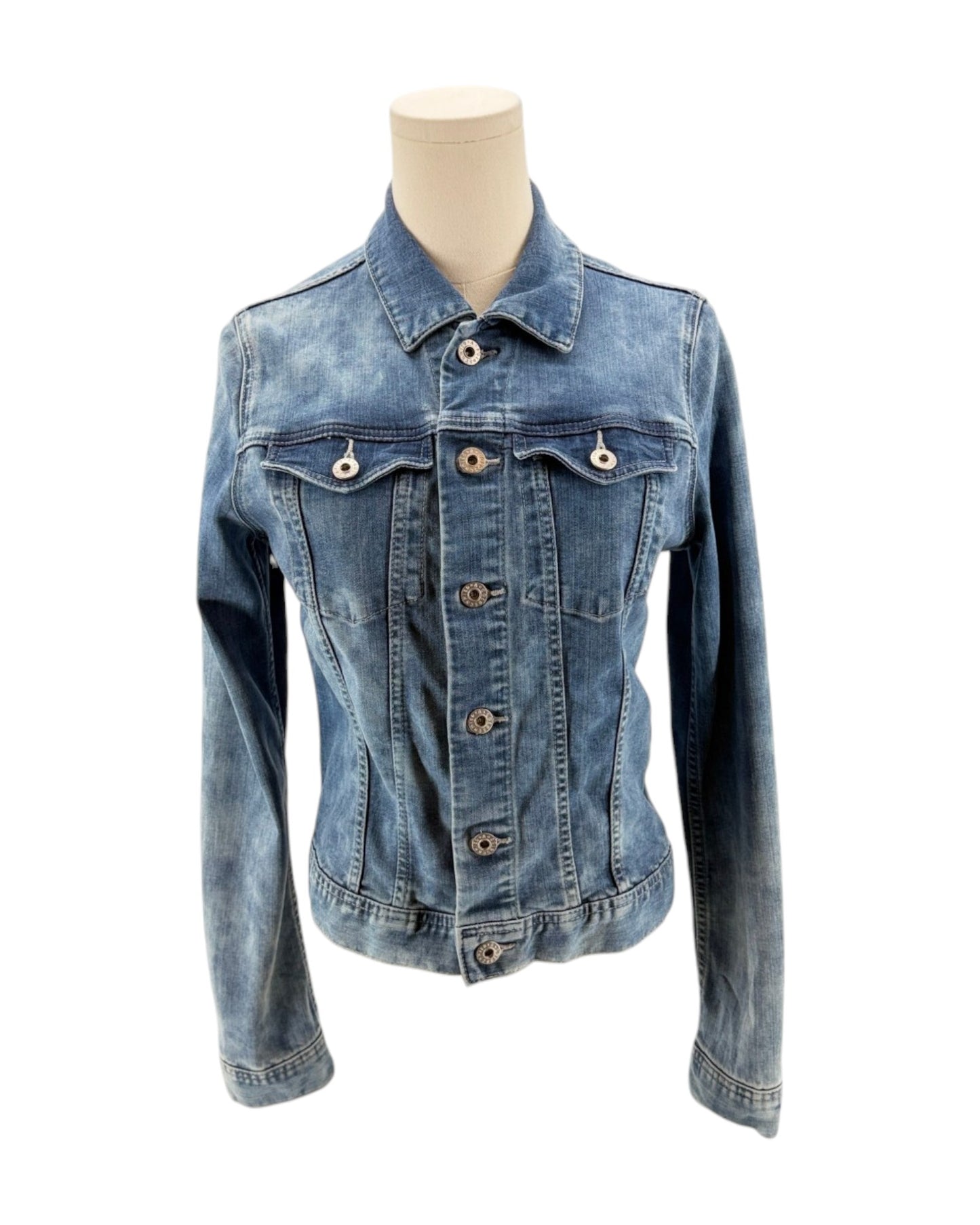 Blue denim jacket on a mannequin against a white background