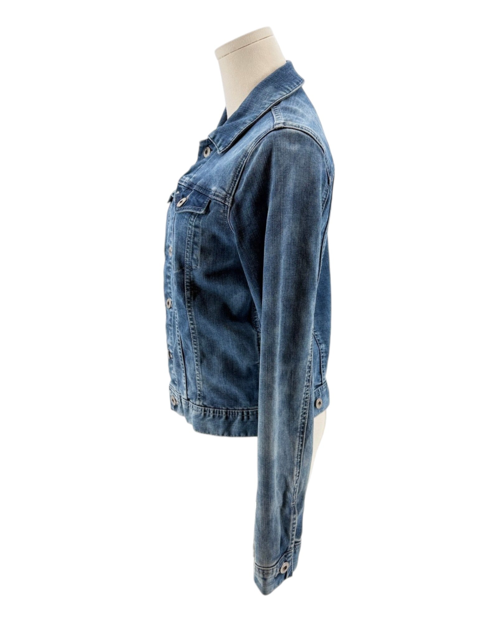 Blue denim jacket on a mannequin against a white background