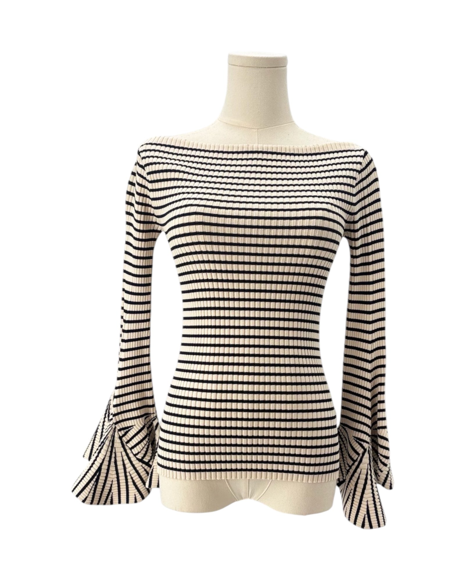 Black and white striped top on a mannequin against a white background