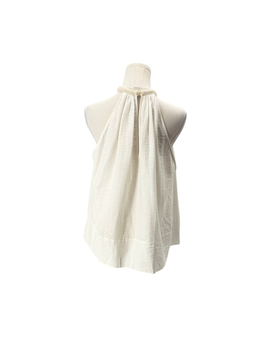 An off-white halter-neck top made of textured, crinkled fabric, displayed on a cream mannequin torso against a solid white background.