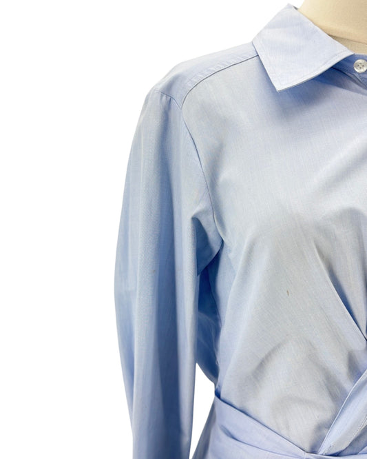 Light blue long sleeve mini dress on a mannequin on a white background