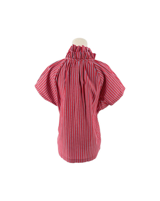 Red High ruffled collar, cap sleeves, hidden front placket top on a mannequin on a white background