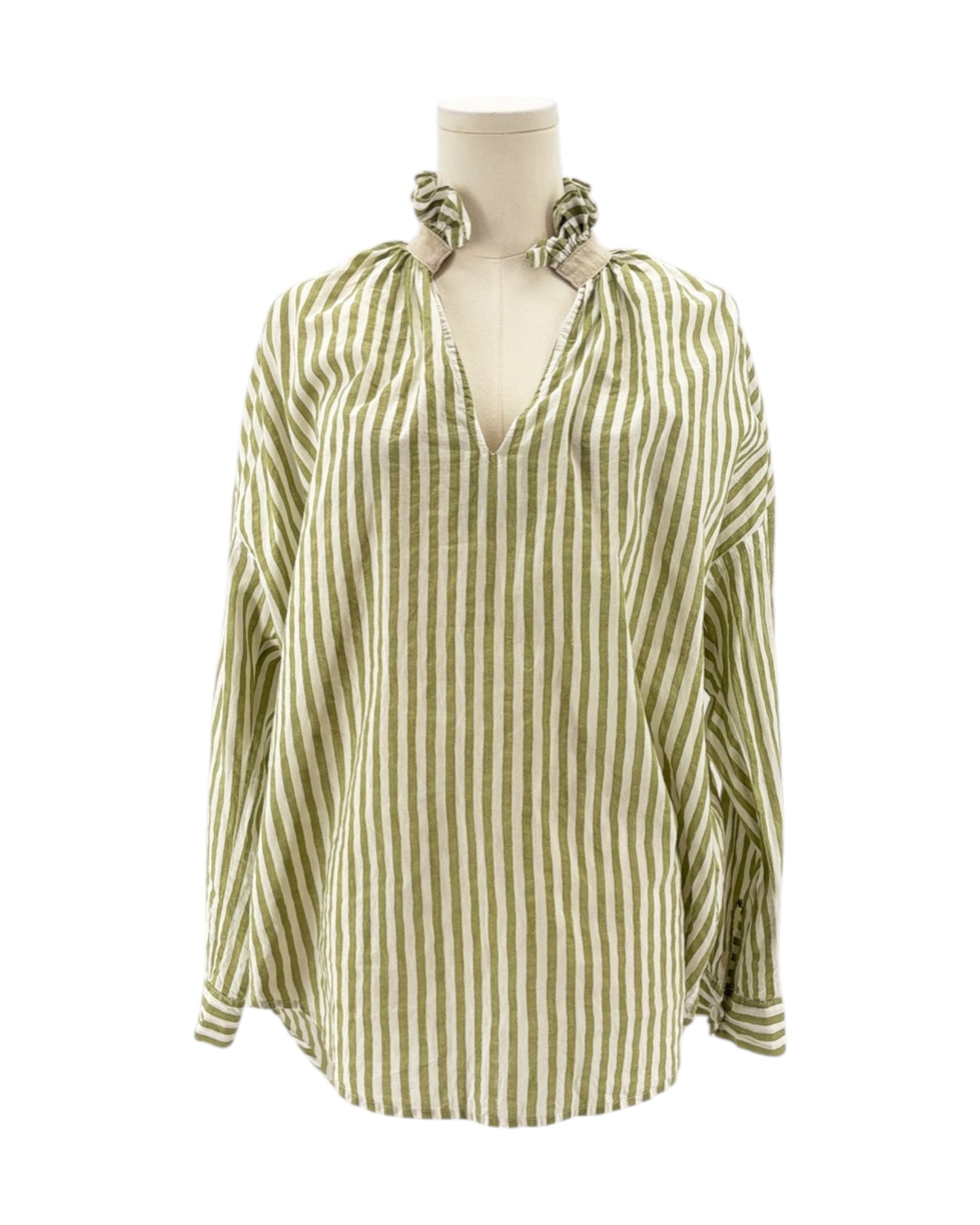 Green and white striped blouse on a mannequin with a white background