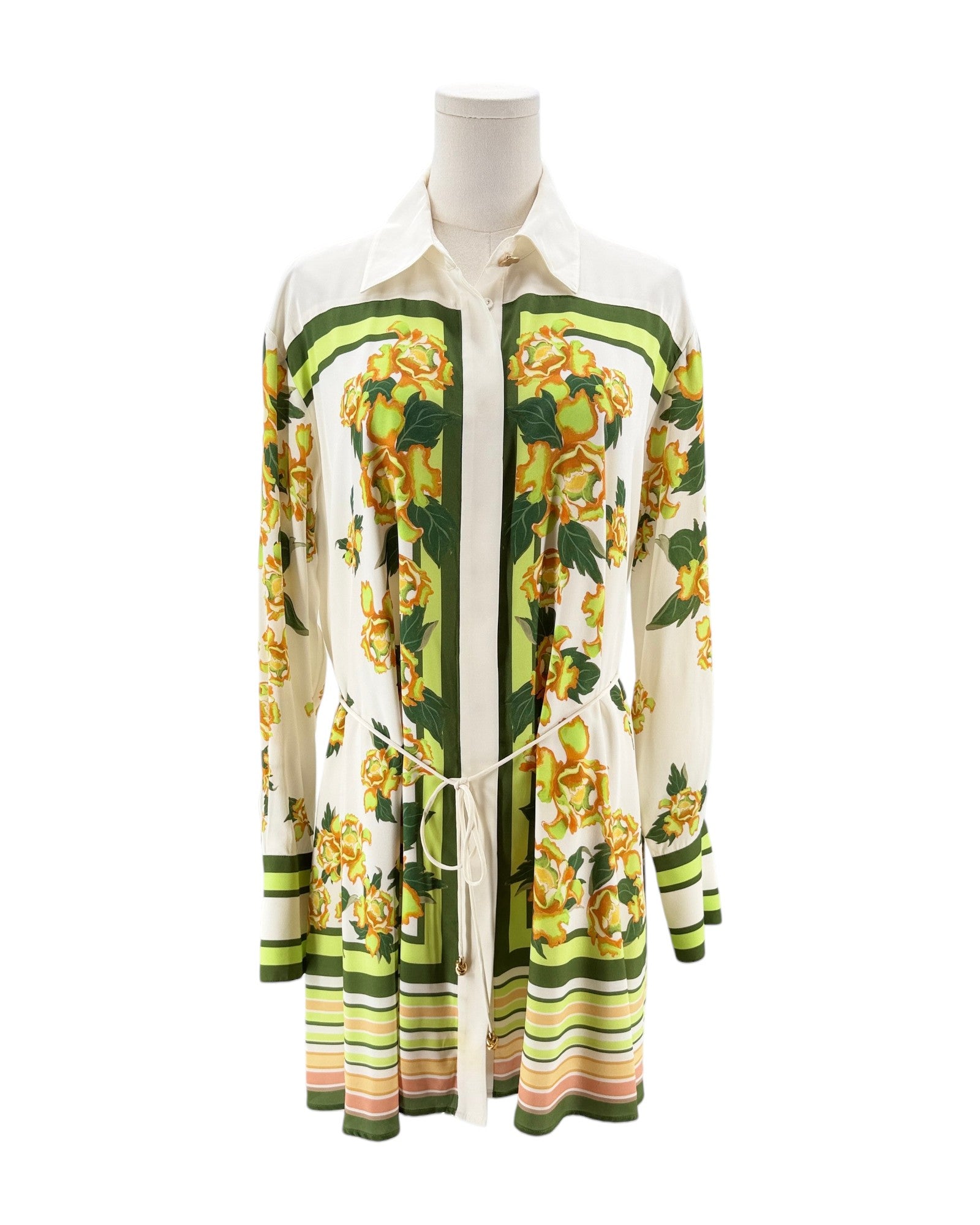 Colorful floral-patterned shirt on a mannequin against a white background