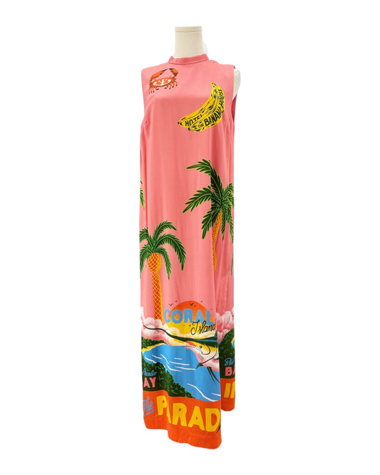 Sleeveless silk dress with tropical design on a mannequin against a white background