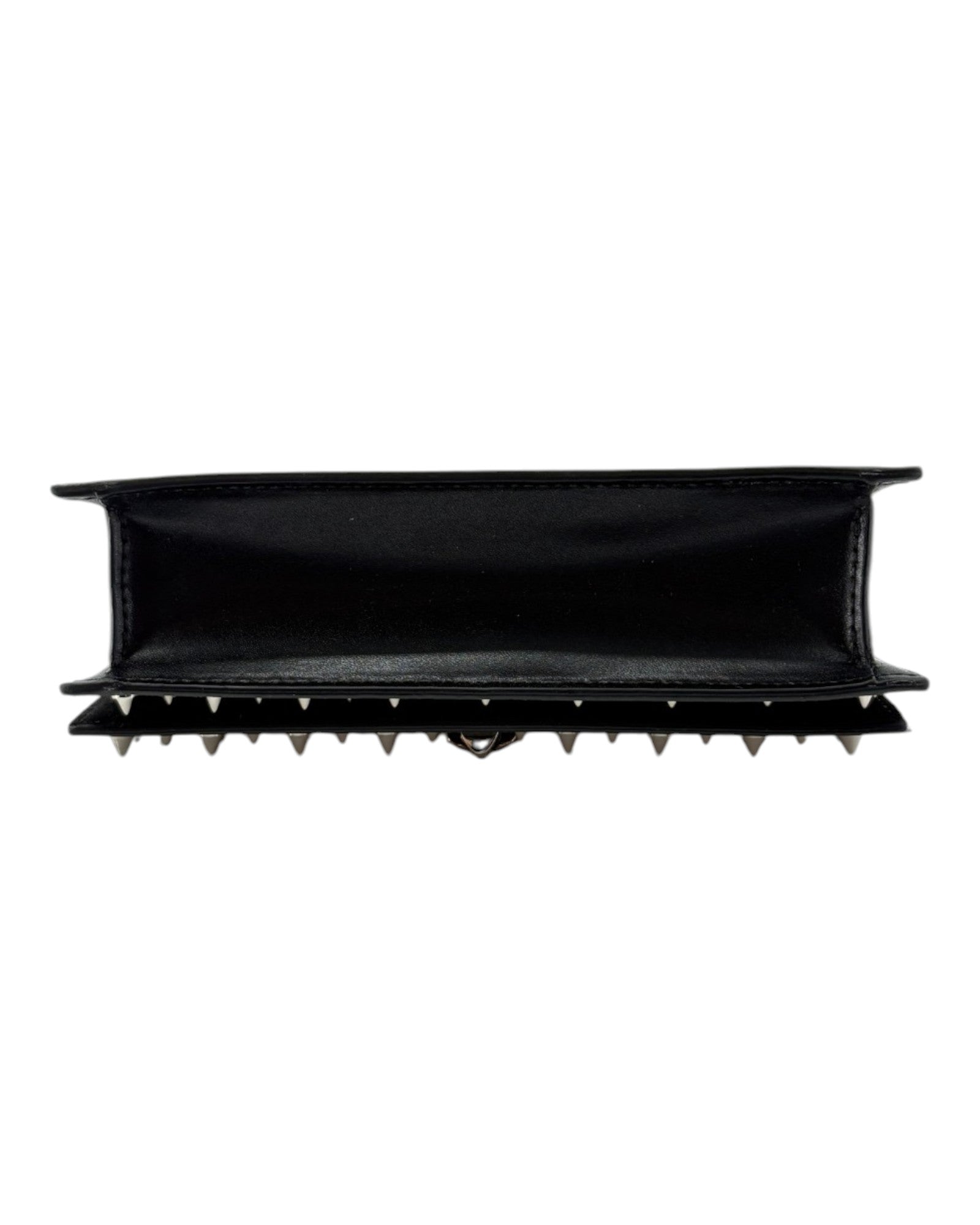 Black handbag with spike details and chain strap on a white background
