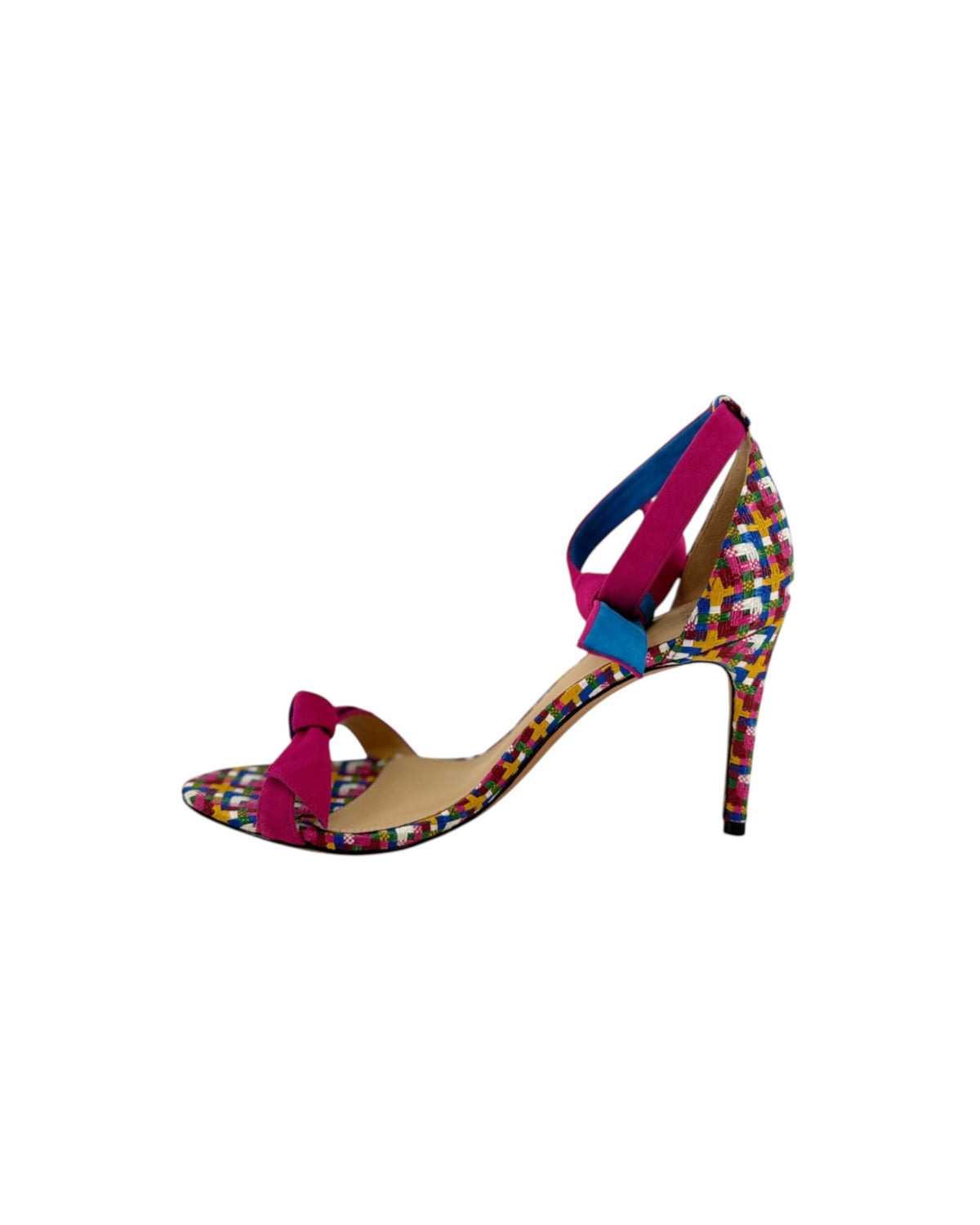 High heels with a multi color geometric print with a pink ankle and toe strap on white background
