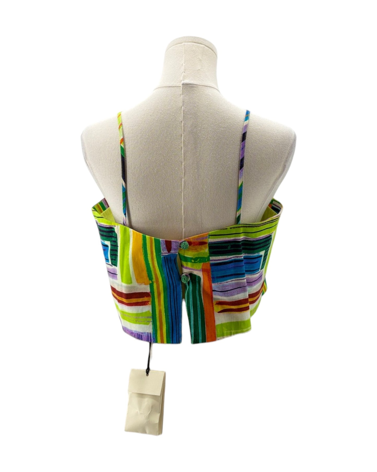 Colorful striped top on a mannequin with a white background
