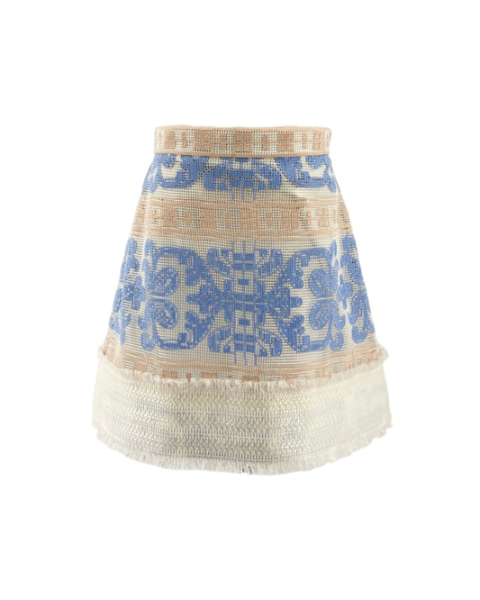 Skirt with blue patterned top and beige bottom on a white background