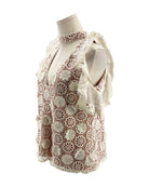 Lace v neck short sleeve blouse on a mannequin on a white background