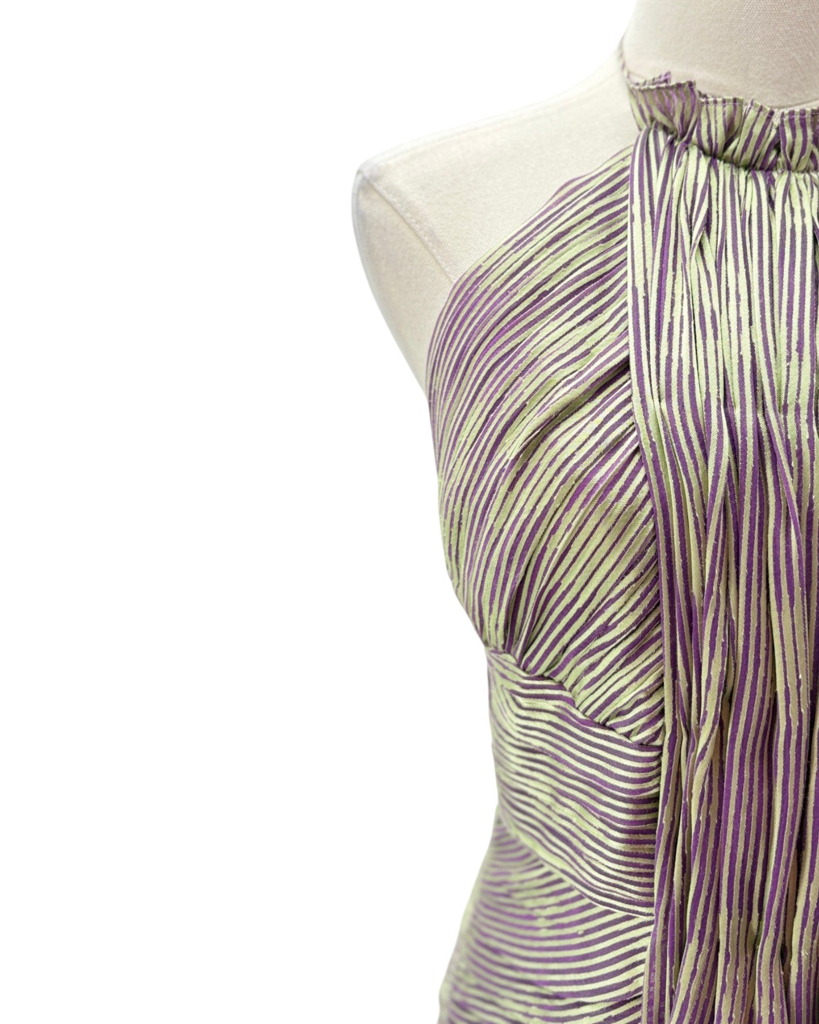 Striped halter top on a mannequin against a white background