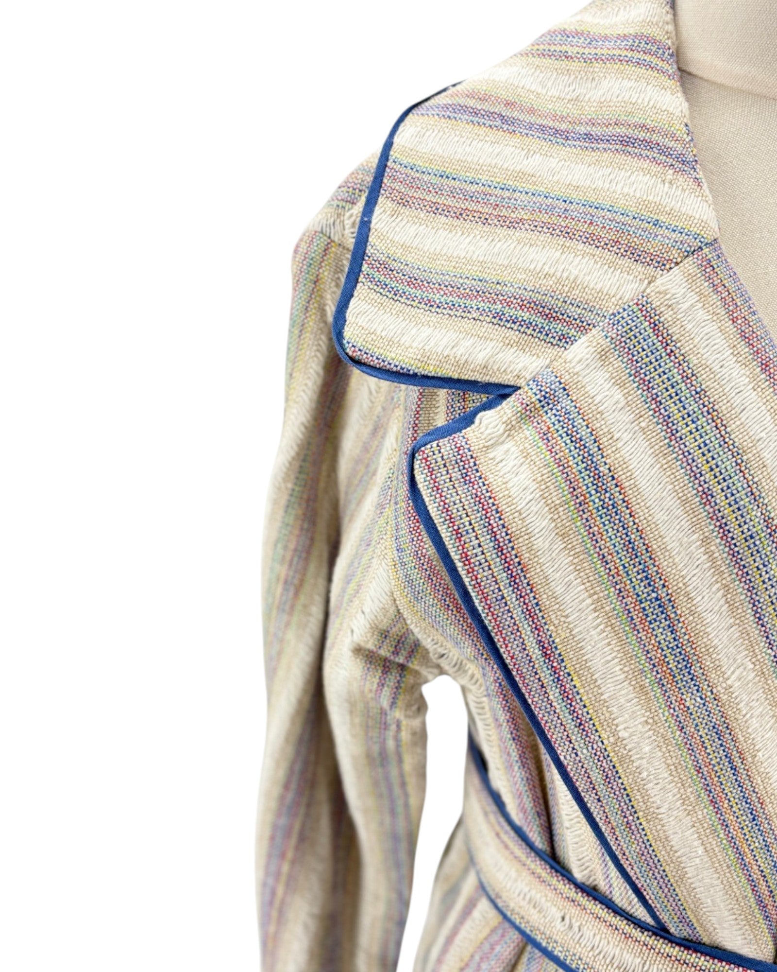 Textured fabric coat with multicolor stripes on a white background