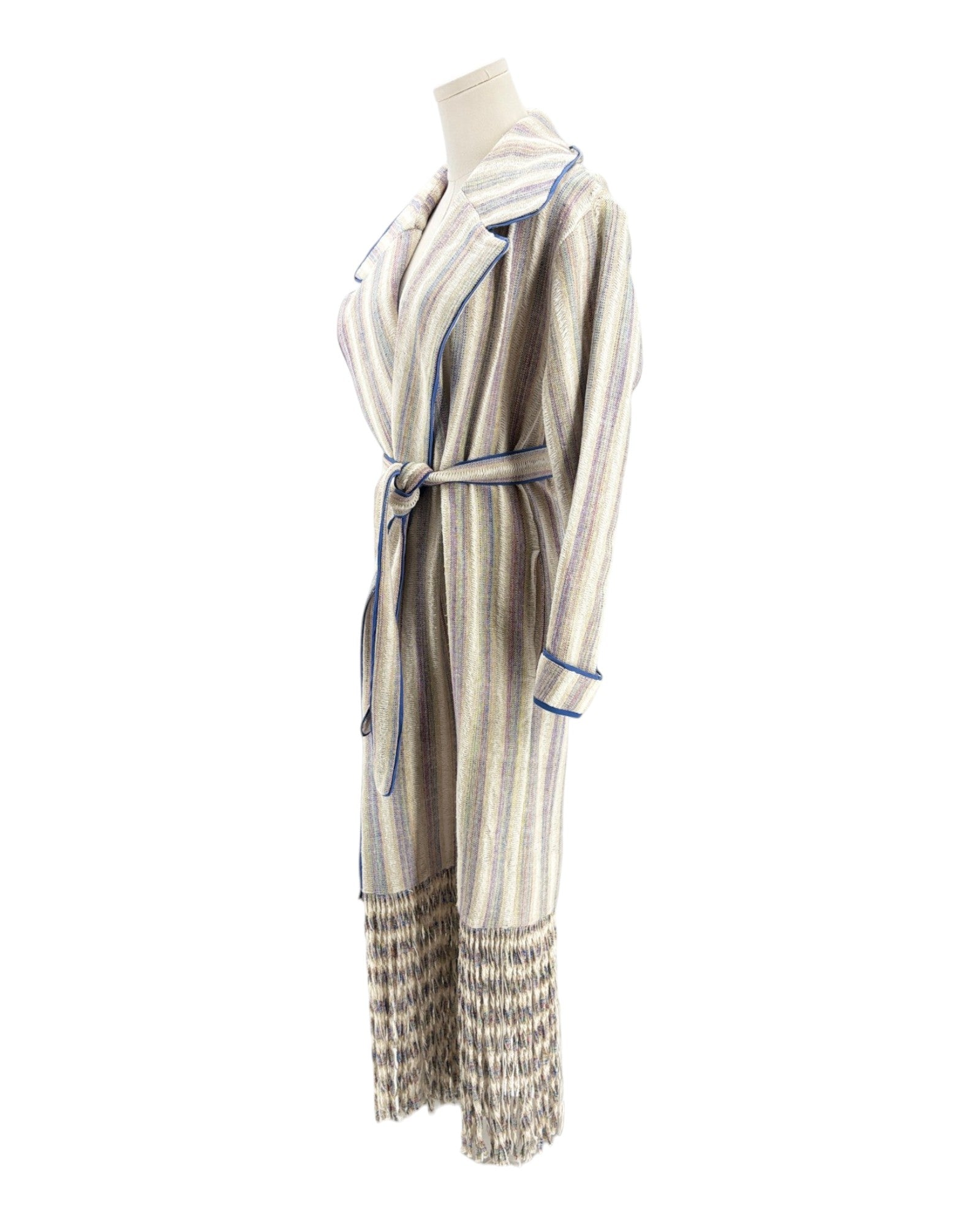 Striped coat on a mannequin against a white background