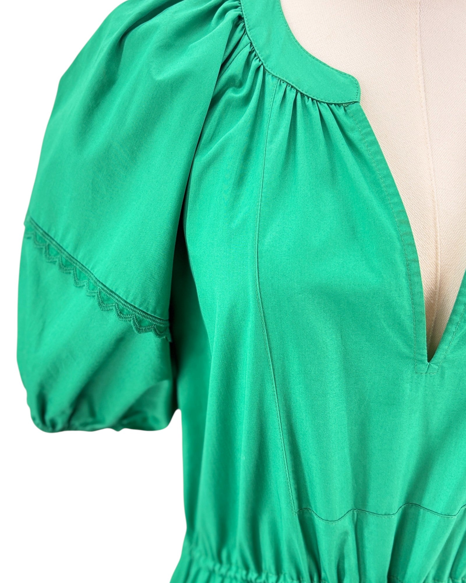 Alexis green dress with puff sleeves and tiered skirt details