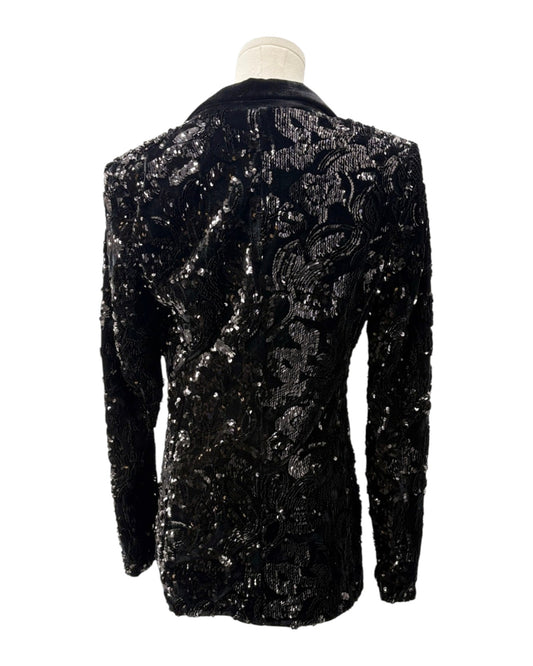 Black sequined jacket on a mannequin against a white background