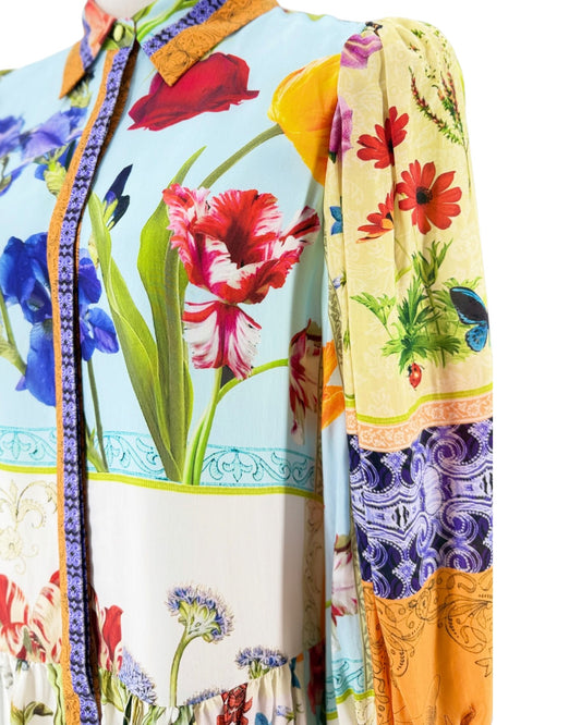 Floral long sleeve multi color mini dress on a white background on a mannequin