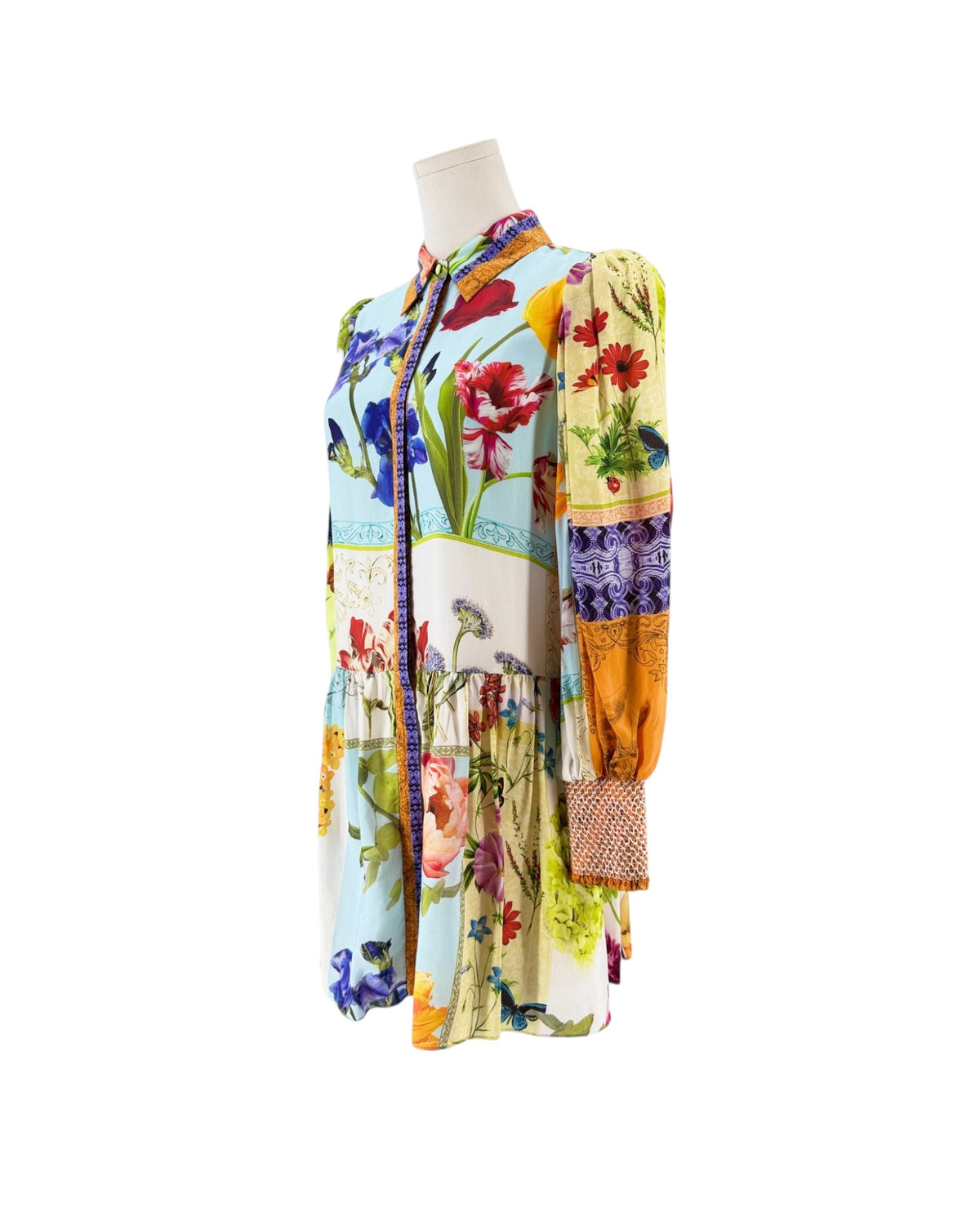 Floral long sleeve multi color mini dress on a white background on a mannequin