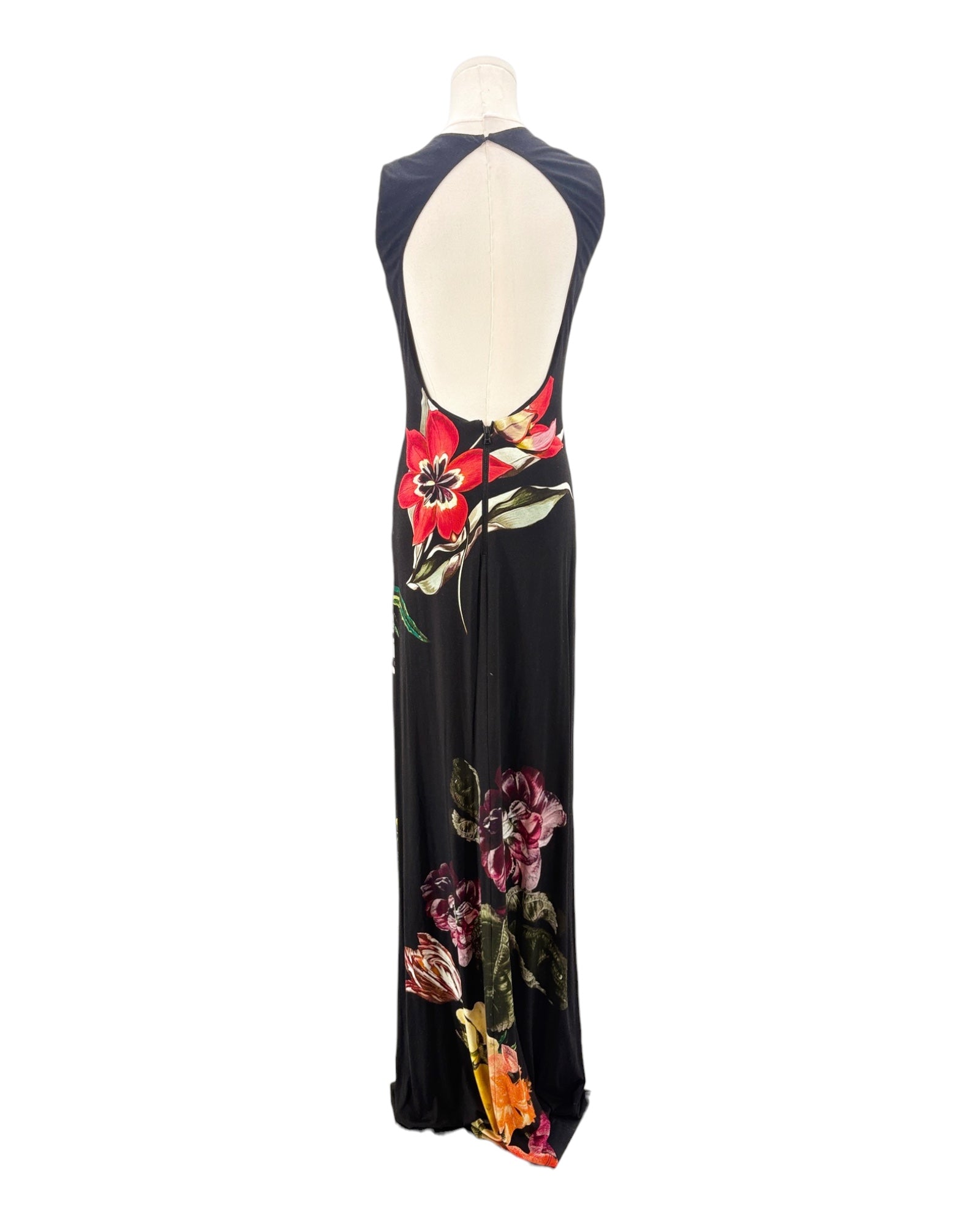 Black dress with colorful floral patterns on a mannequin against a white background