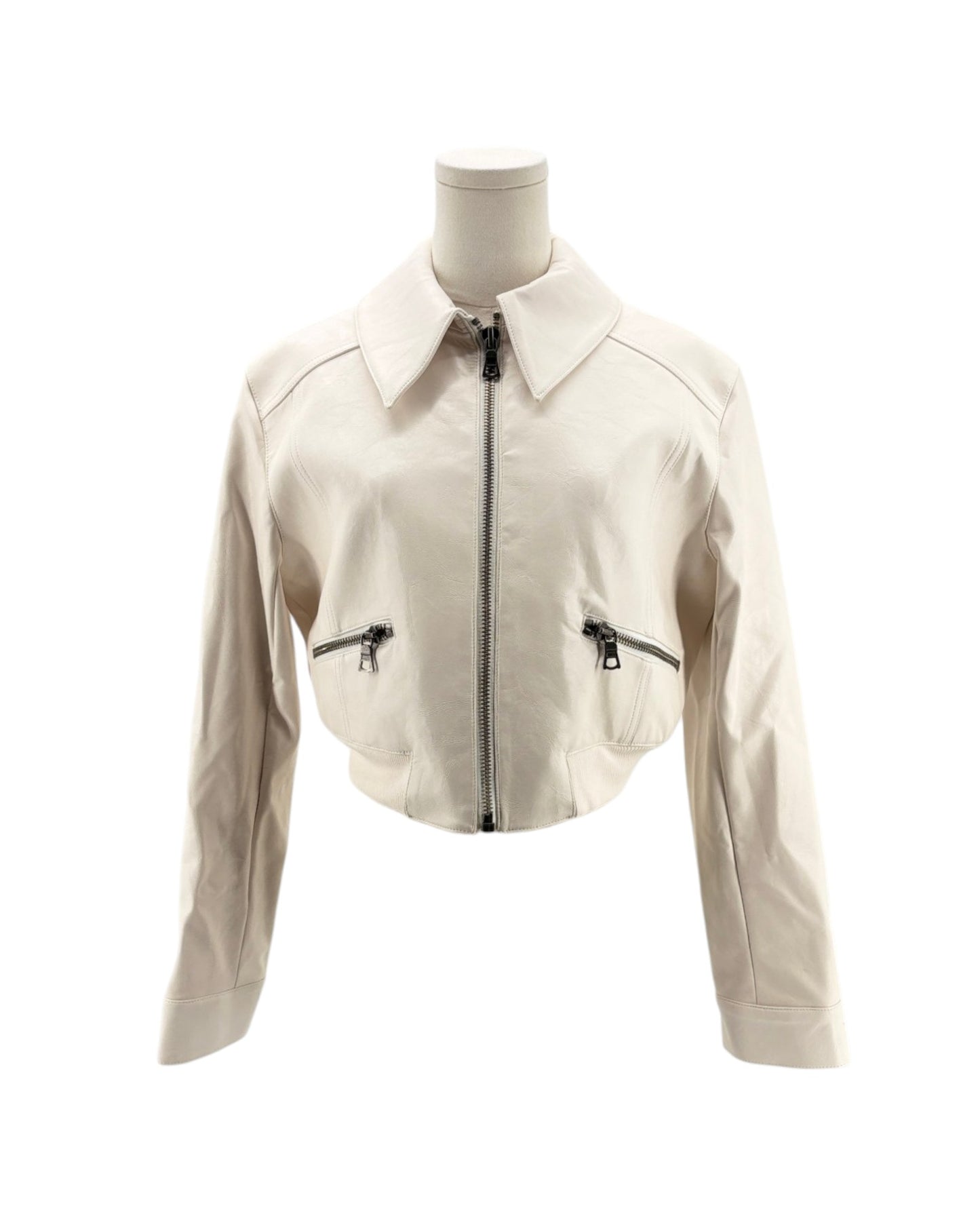 Beige leather jacket on a mannequin against a white background