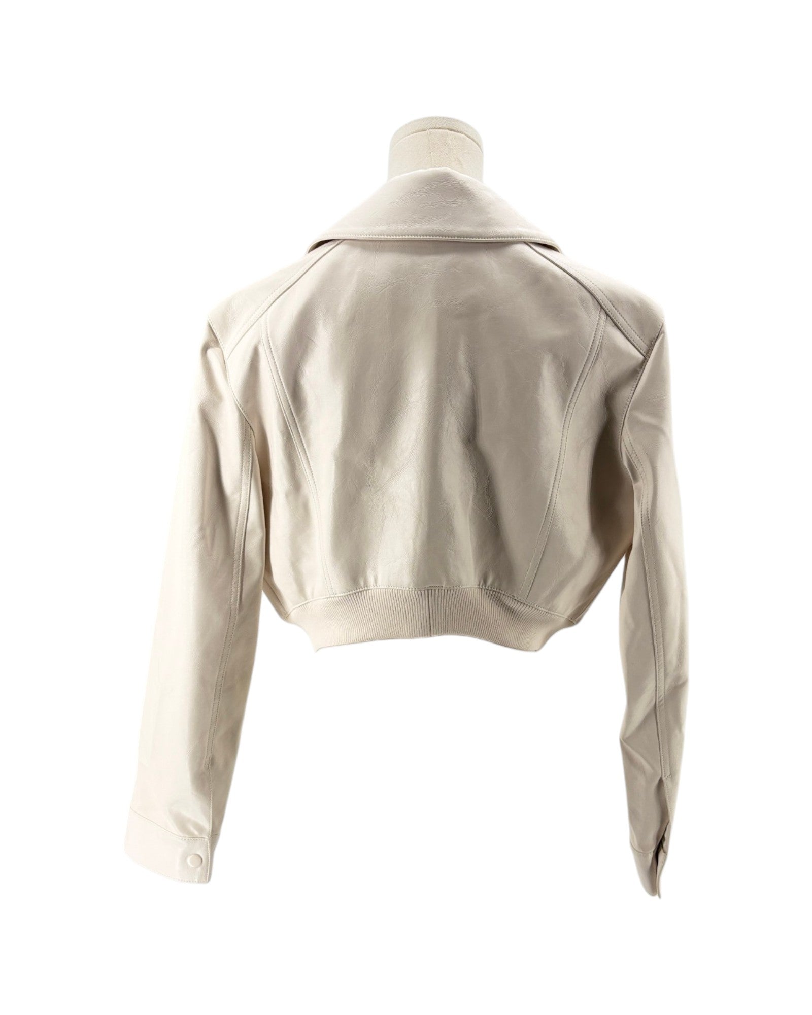 Beige jacket on a mannequin against a white background
