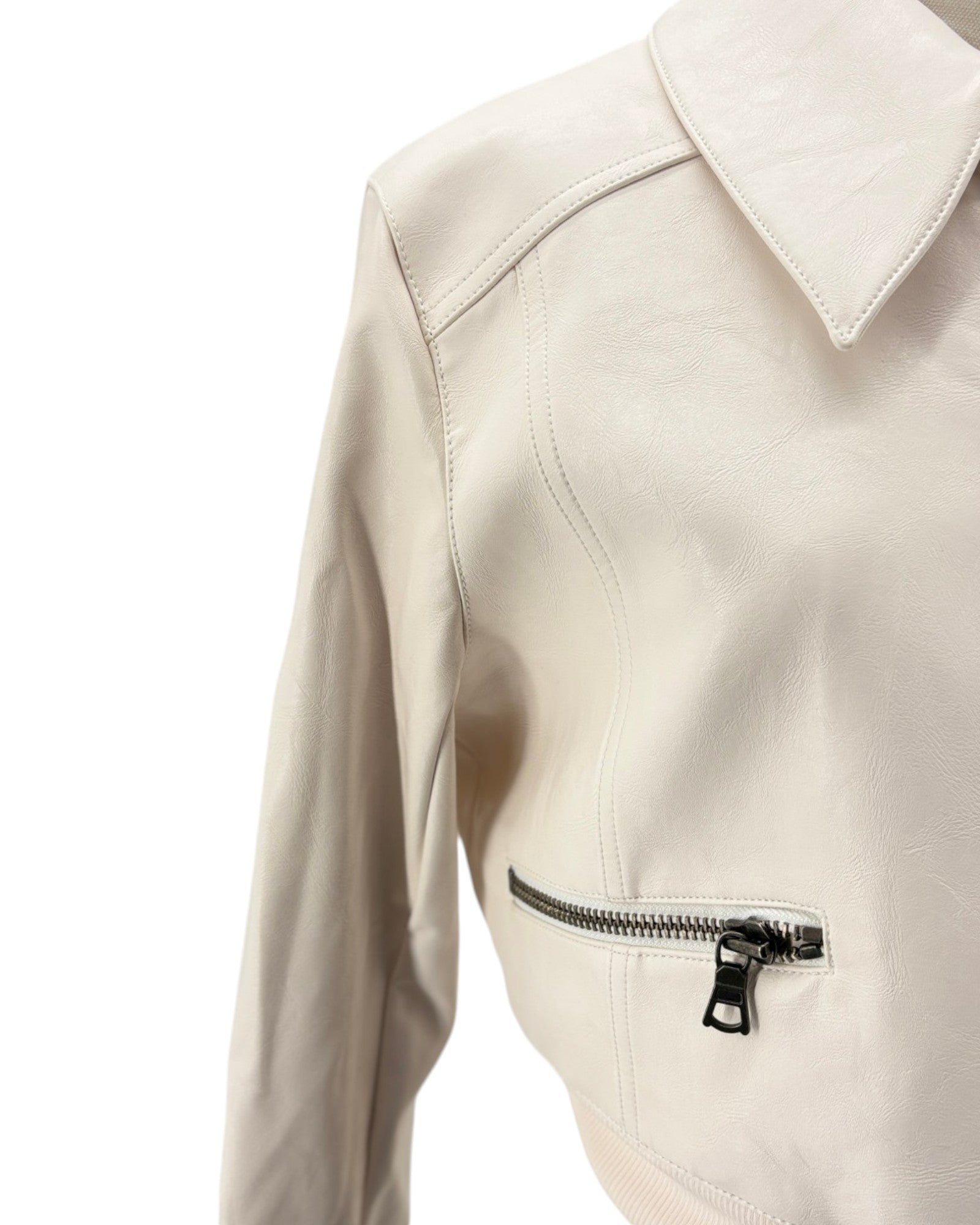Close-up of a beige jacket with a zipper on a white background