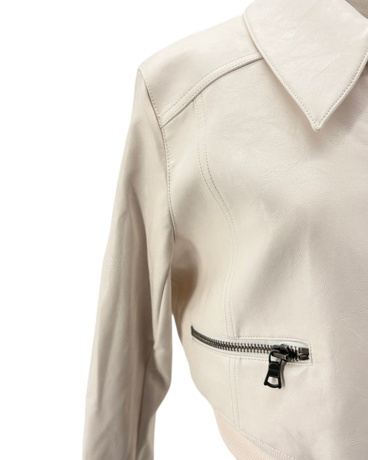 Close-up of a beige jacket with a zipper on a white background