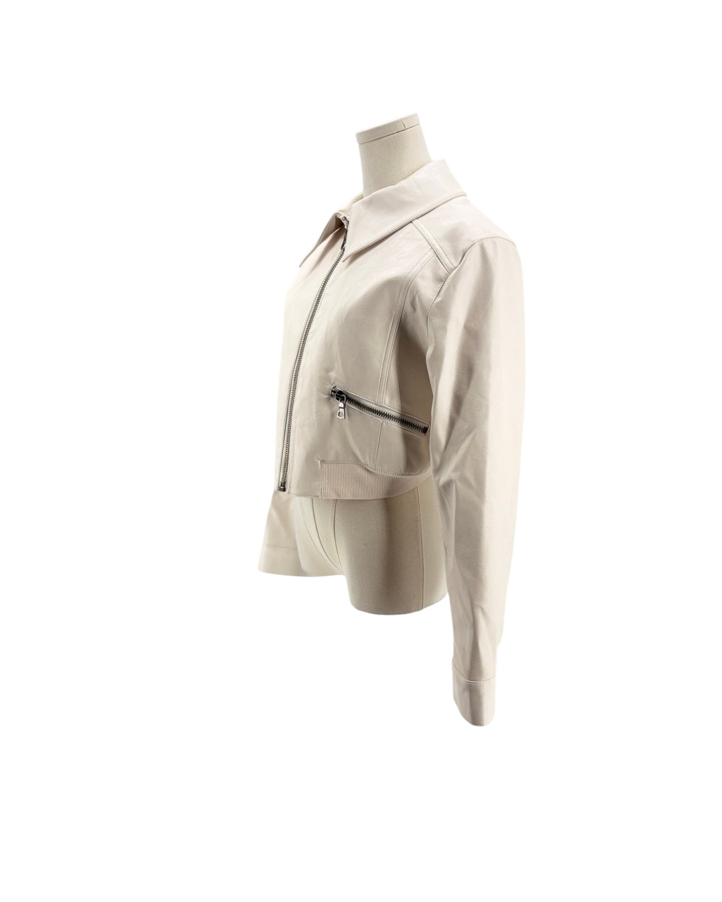 Beige jacket on a mannequin against a white background