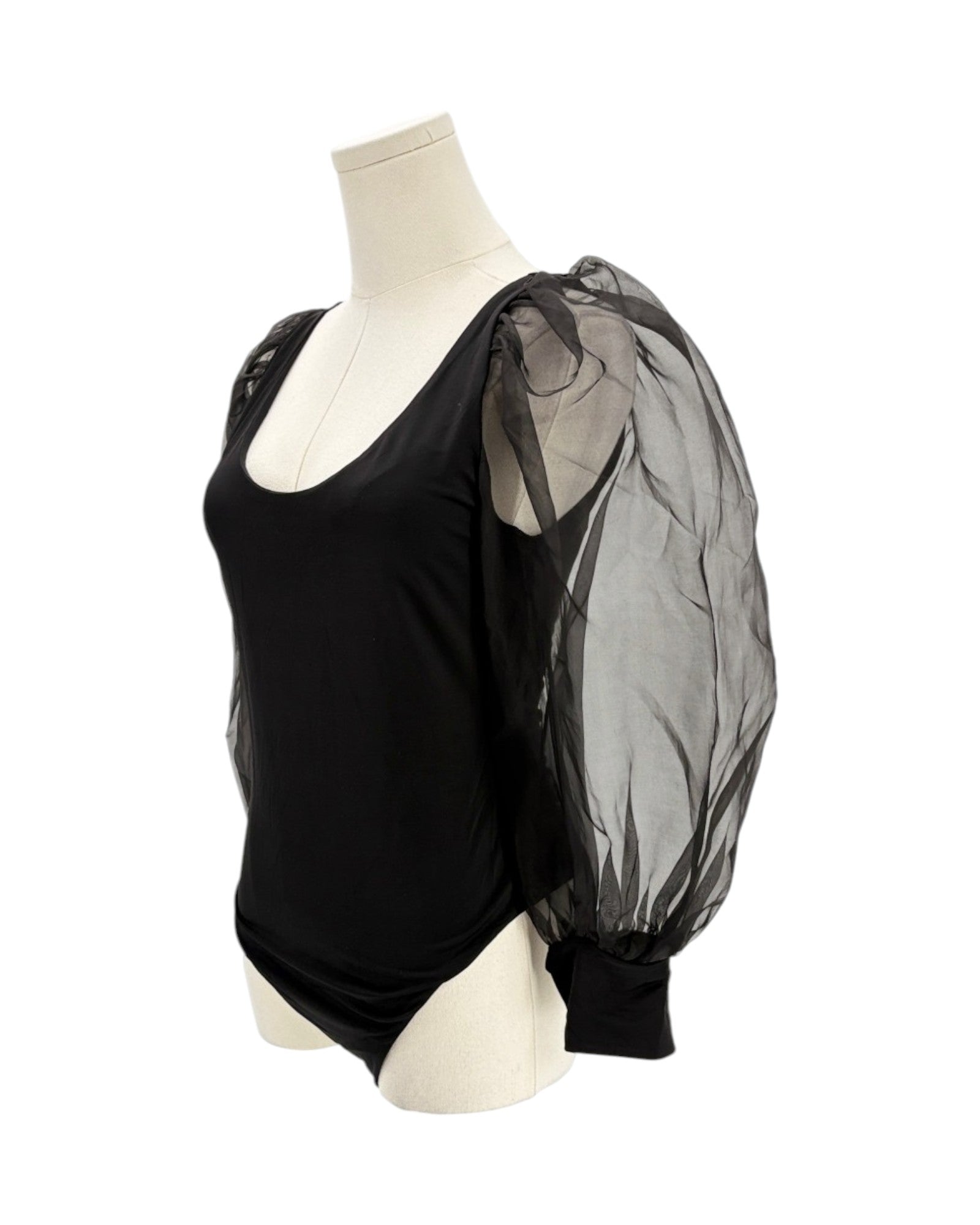 Black puff sleeve bodysuit with sheer black sleeves on a mannequin against a white background