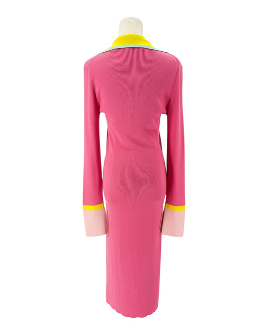 Pink ribbed long sleeve midi dress with yellow details on the collar and cuffs. On and white background on a mannequin