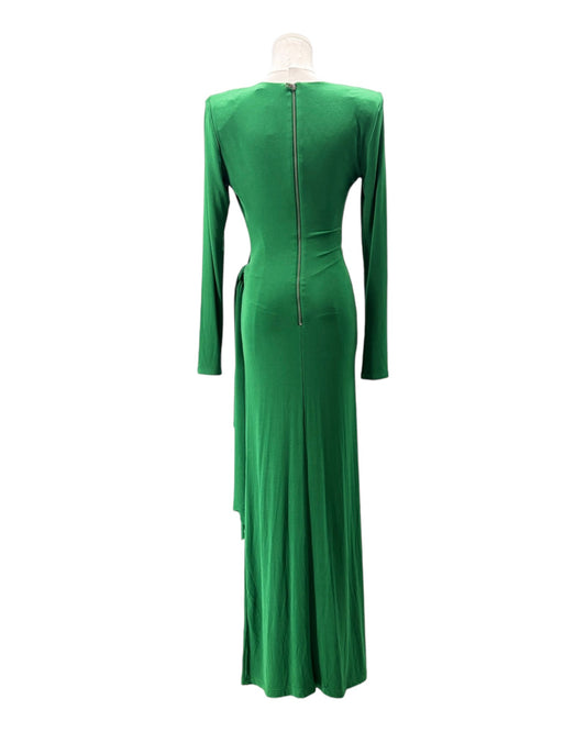 Green dress on a mannequin against a white background