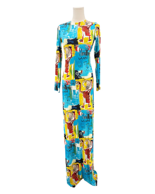 Colorful patterned dress on a mannequin against a white background