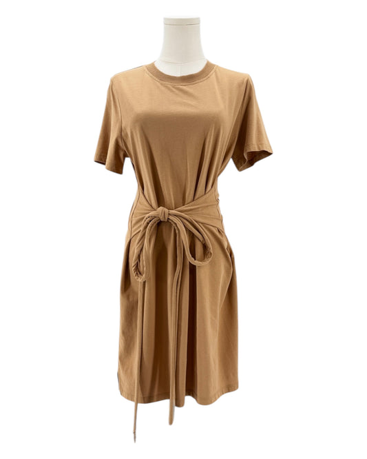 Tan dress on a mannequin against a white background