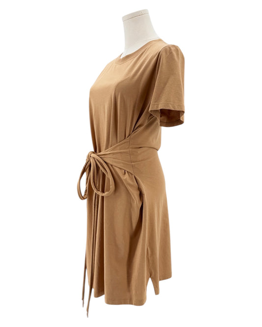 Tan dress on a mannequin against a white background