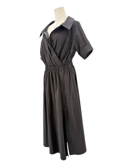 Black dress on a mannequin against a white background