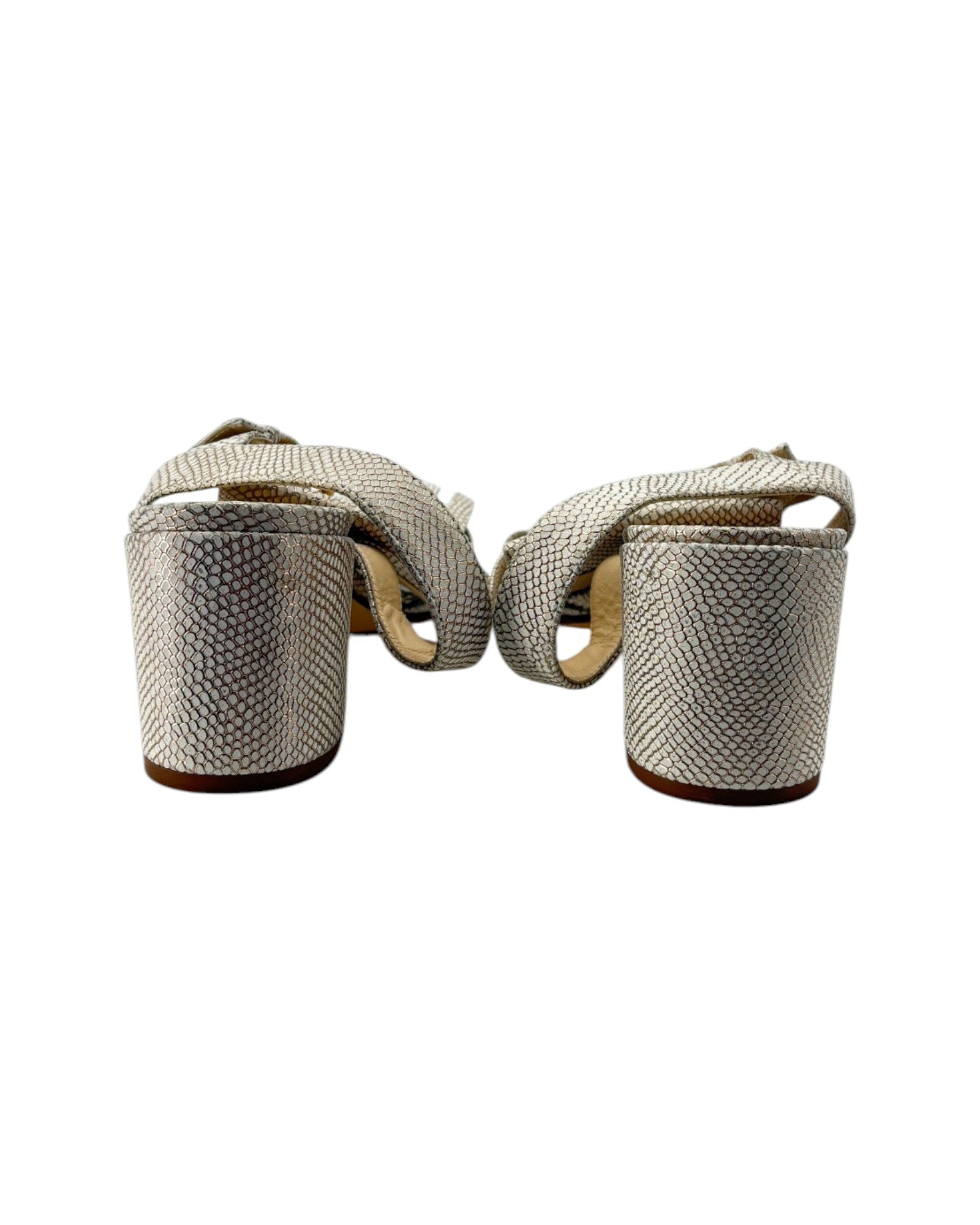 Beige high-heeled sandal on a white background