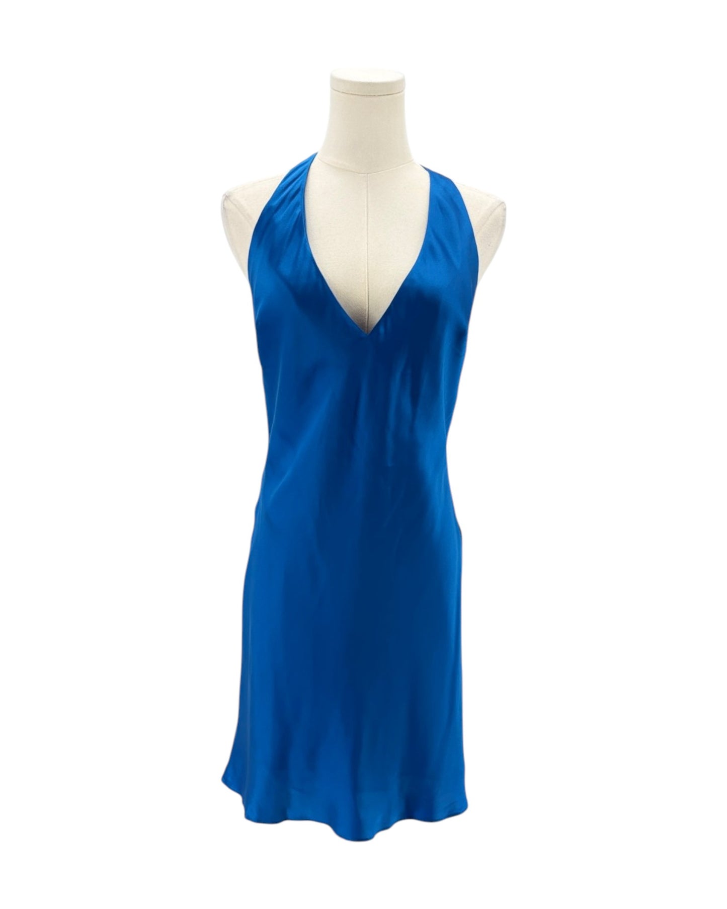Blue dress on a mannequin against a white background