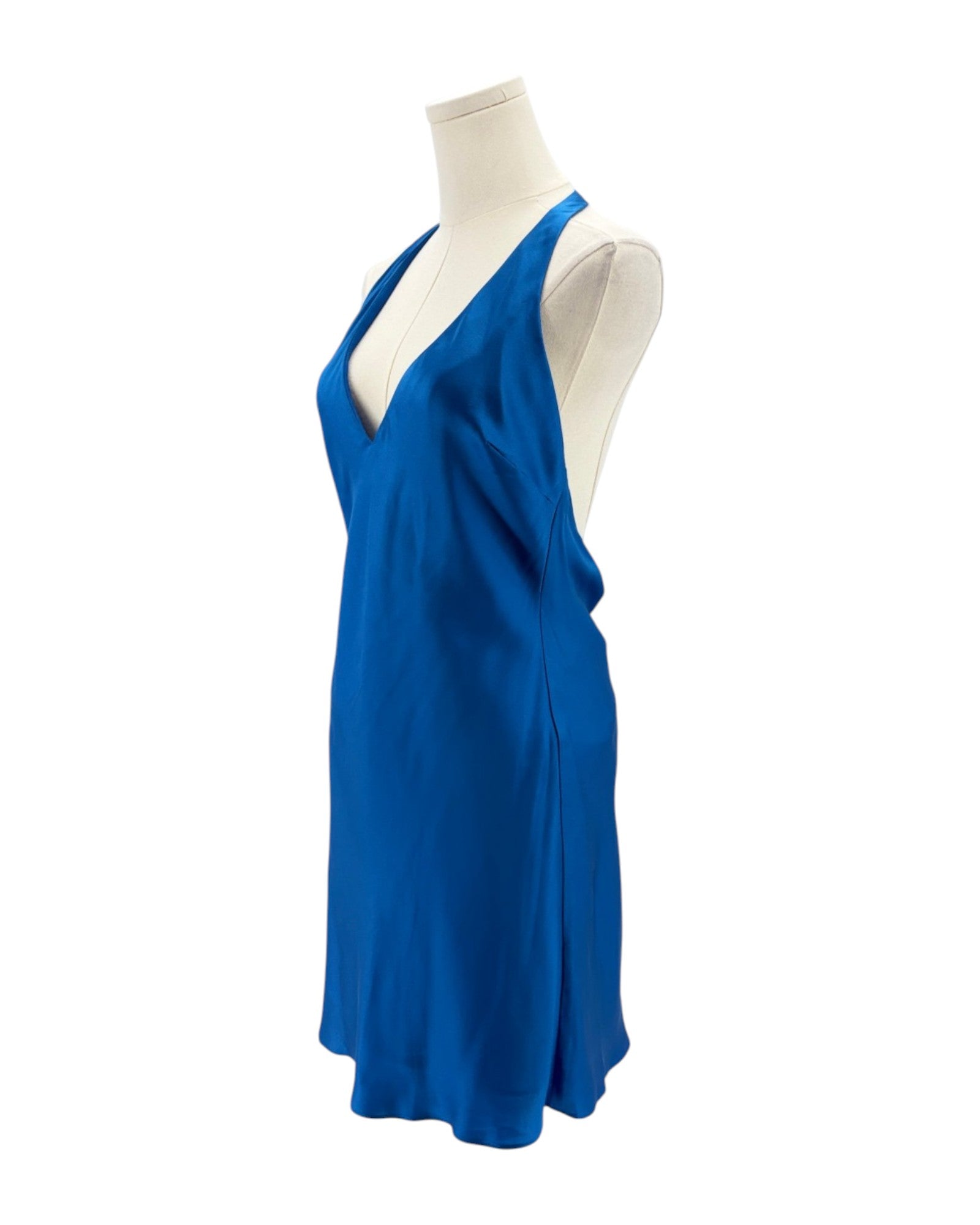 Blue dress on a mannequin against a white background