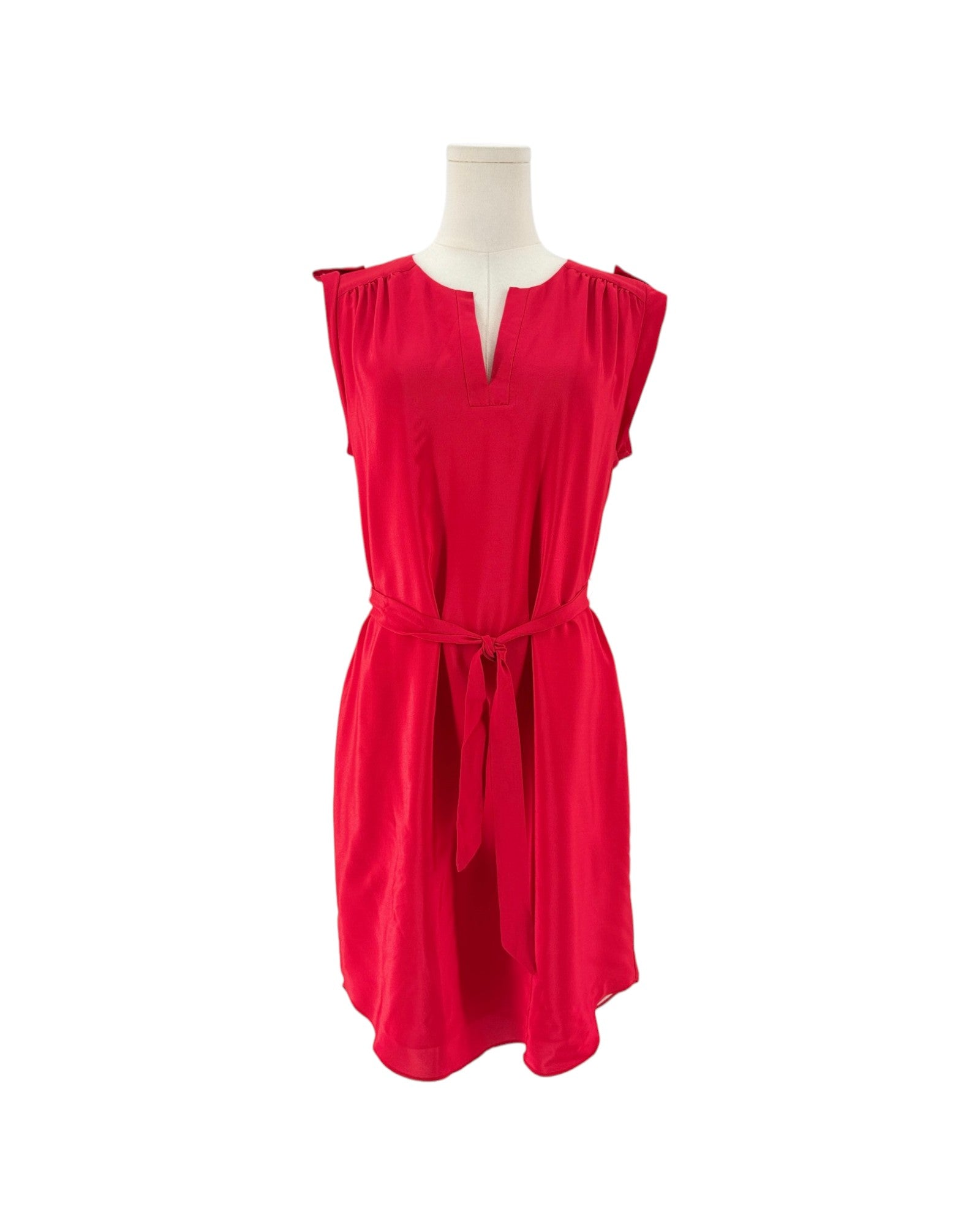A bright red sleeveless dress displayed on a mannequin torso against a plain white background.