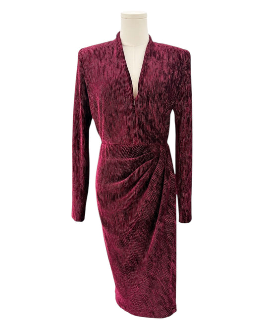Maroon velvet dress on a mannequin against a white background