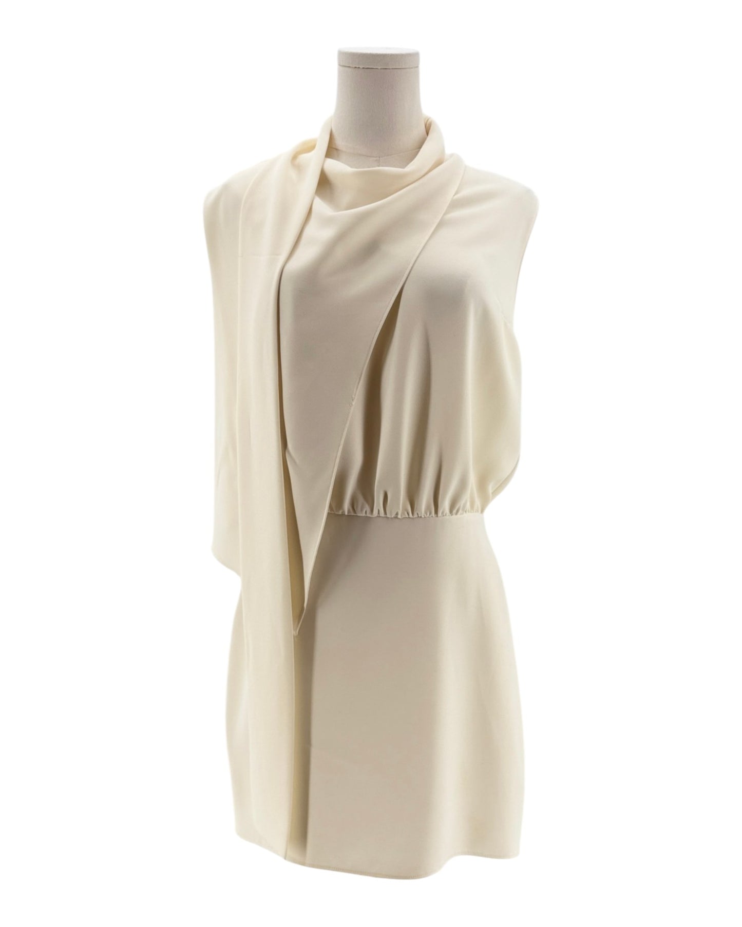 Beige sleeveless dress on a mannequin against a white background