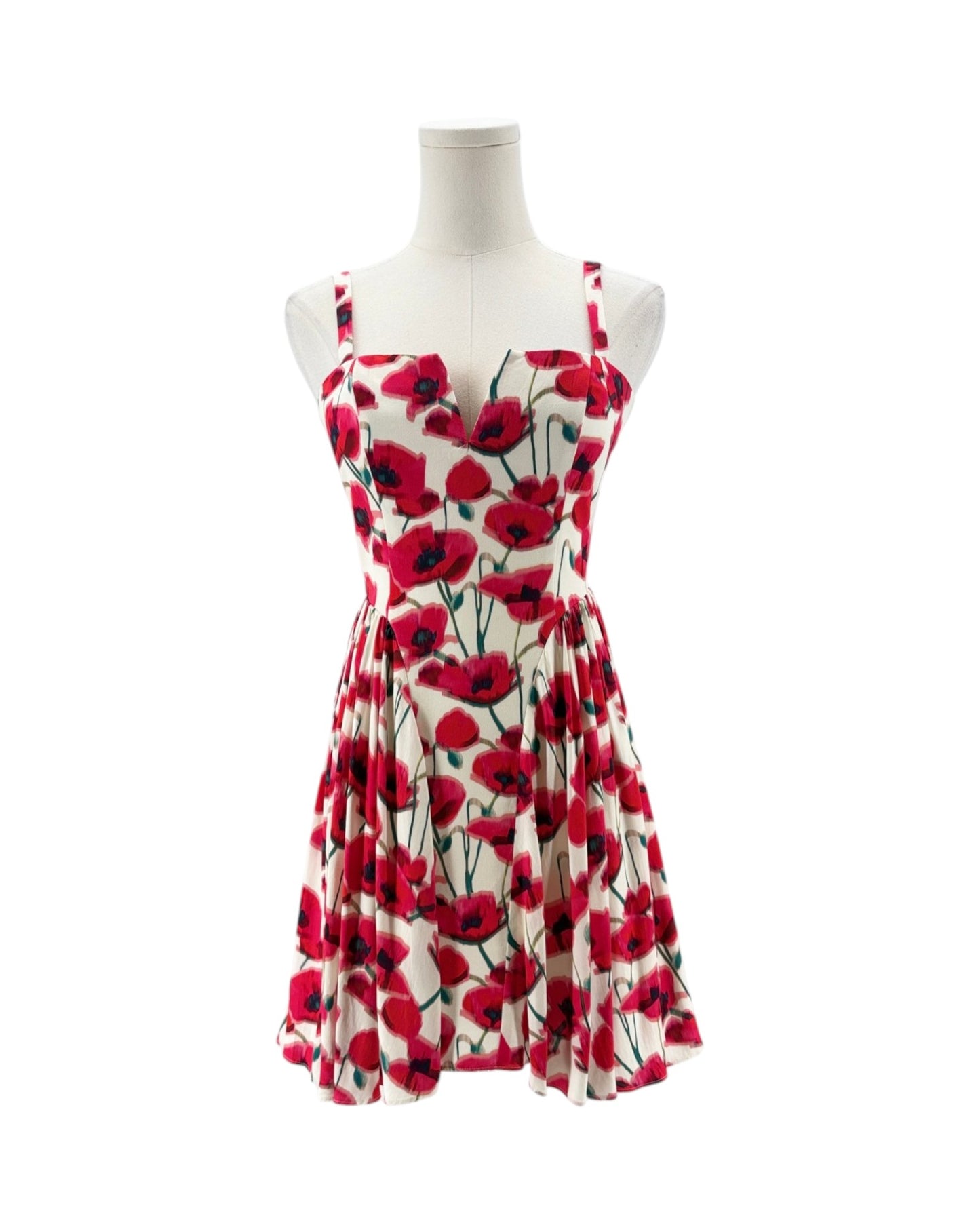 Red floral dress on a mannequin against a white background