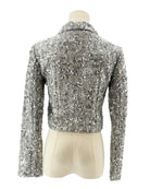Amanda Uprichard silver sequin jacket on a mannequin against a white background