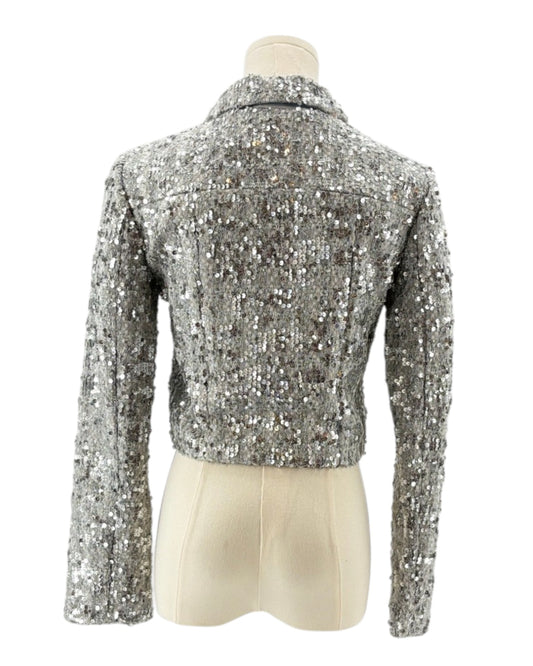 Amanda Uprichard silver sequin jacket on a mannequin against a white background