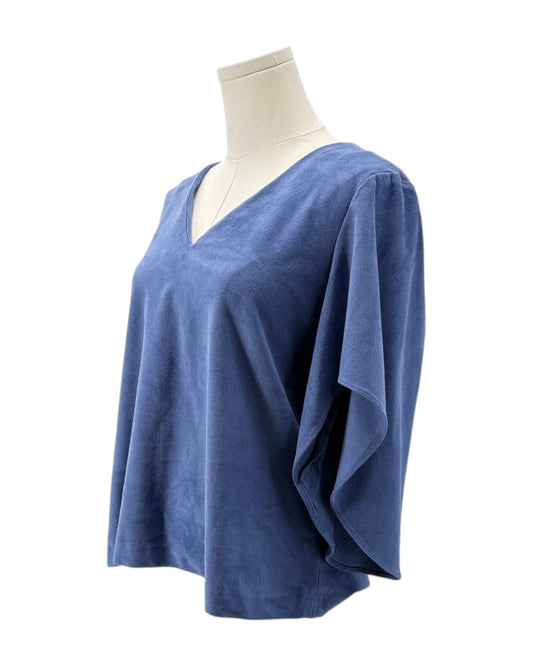 Blue blouse on a mannequin against a white background