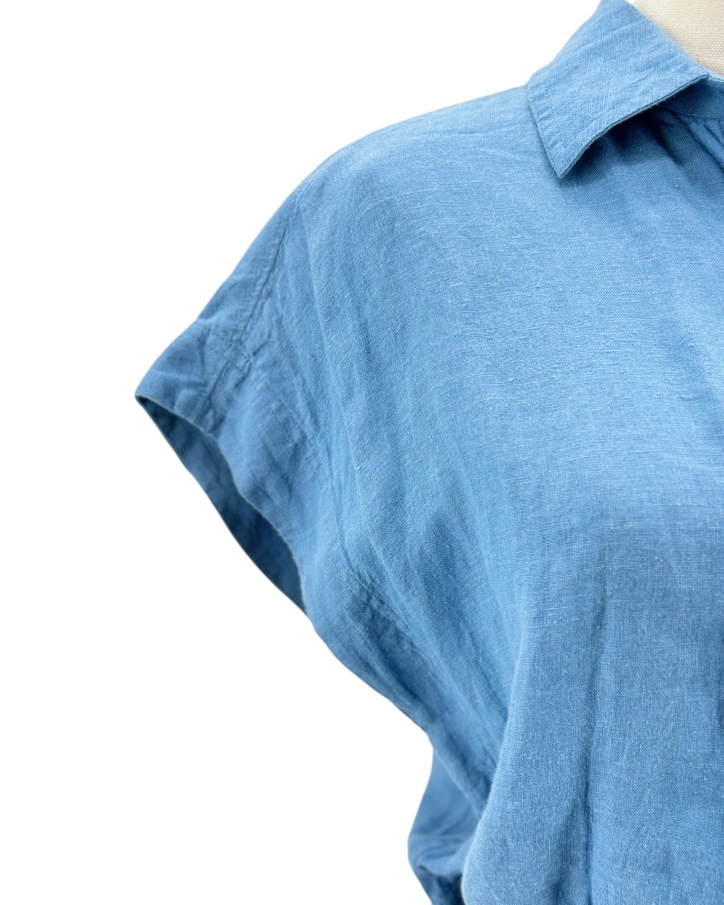 Blue linen mini dress on a mannequin on white background