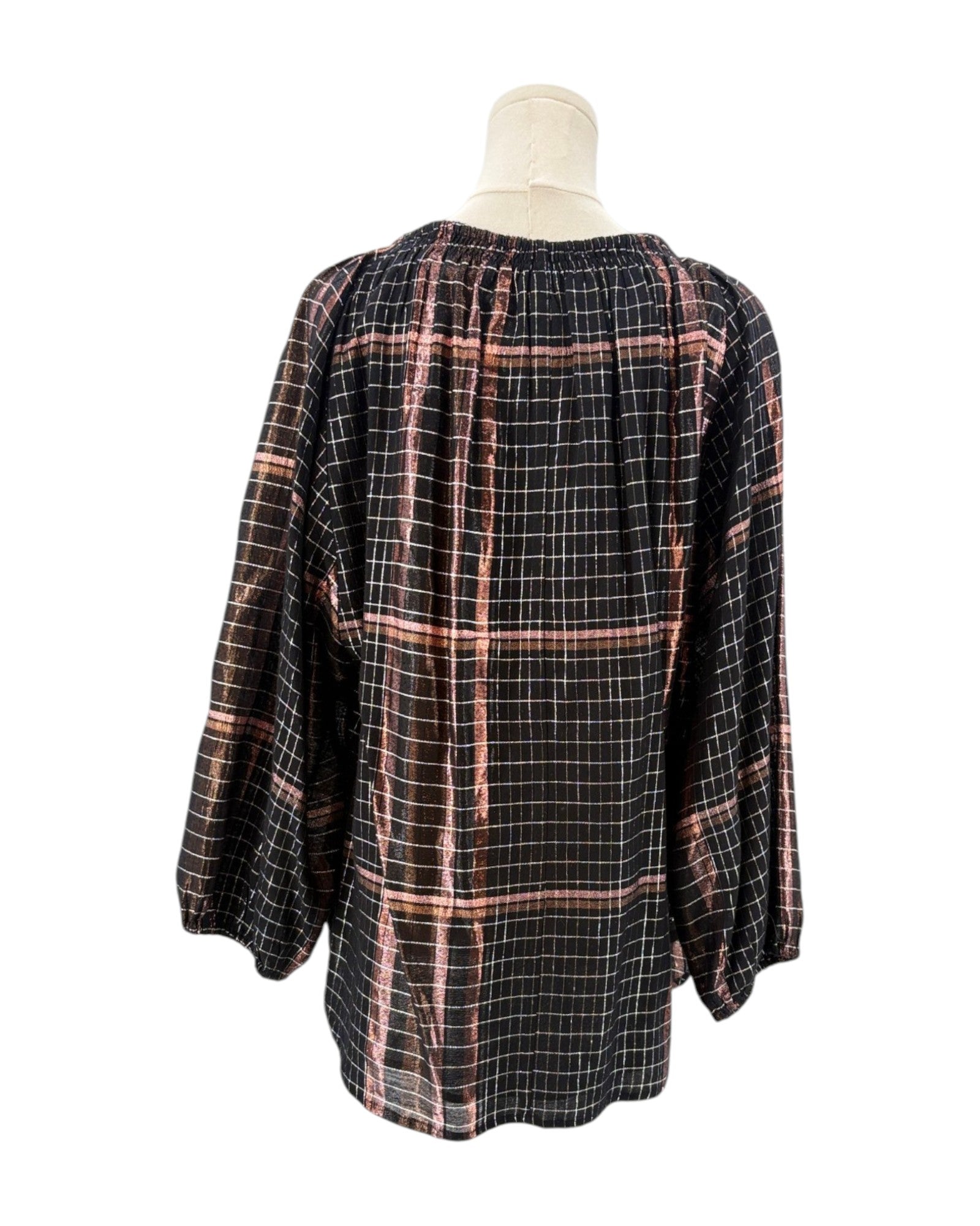 Apiece Apart metallic plaid shirt on a mannequin against a white background