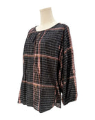 Apiece Apart metallic plaid shirt on a mannequin against a white background